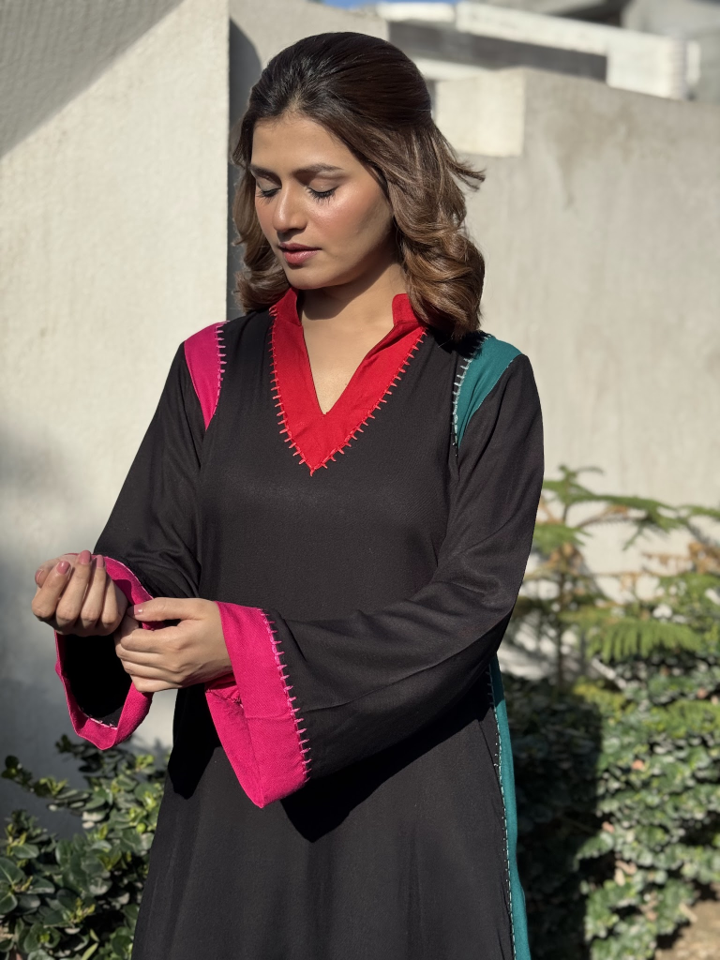Pure marina 2-piece suit with red, pink, and teal color blocking on a dark base.