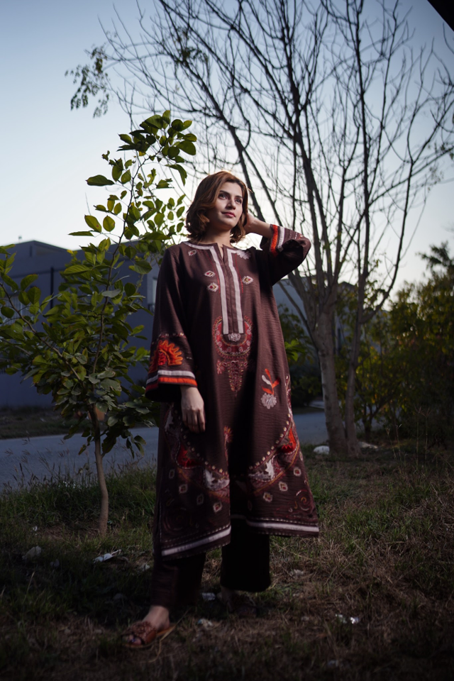 Misha Cut chocolate brown pure Karandi kurta with Scandinavian thread embroidery and appliqué details.